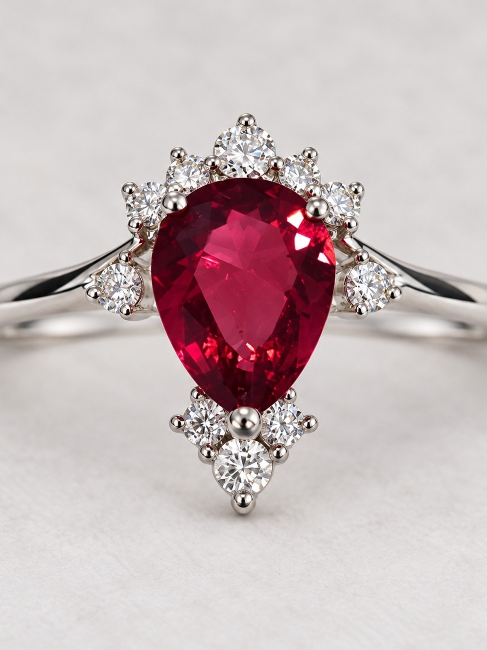 Size 8 Pear-Shaped Red Gemstone Halo Ring in Silver Triple Plated White Gold
